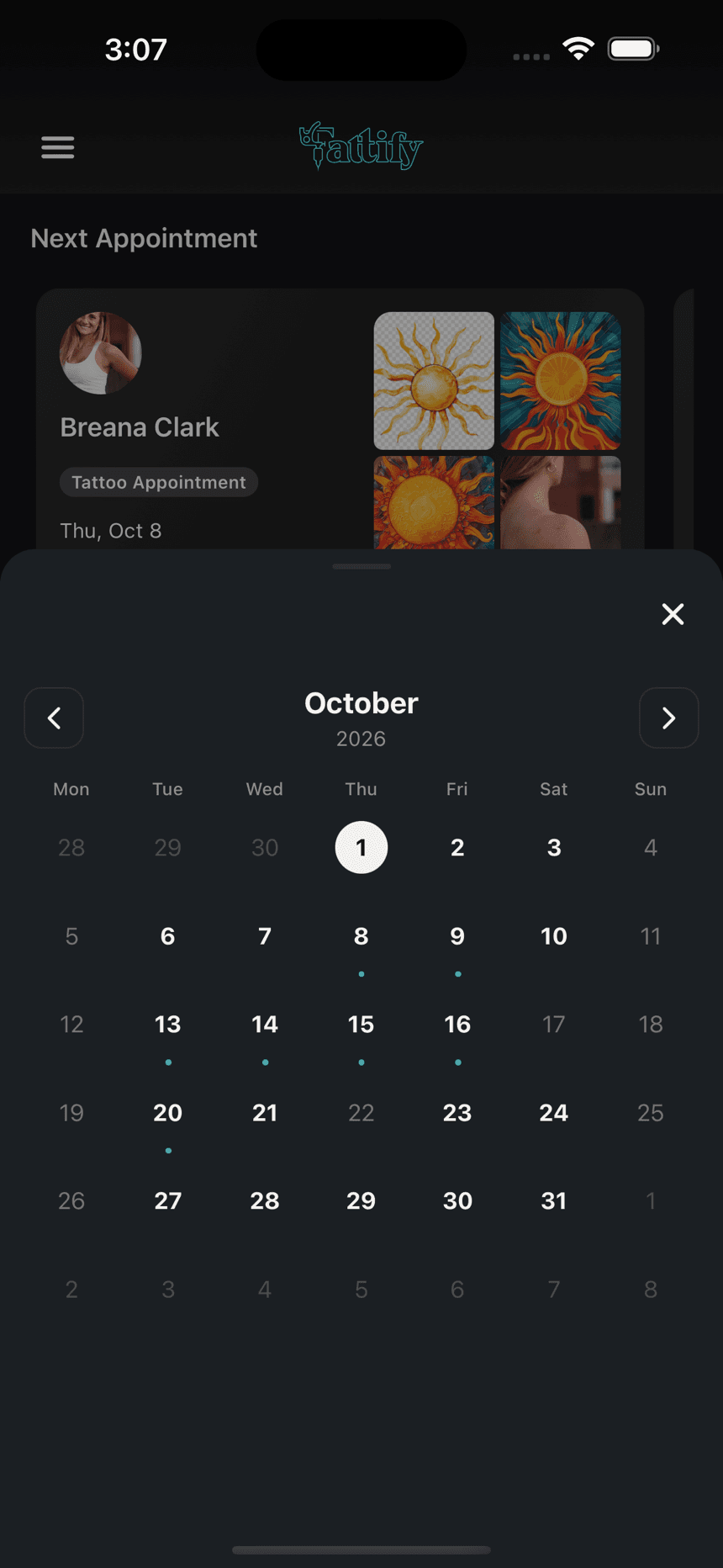 Tattify's calendar, with booked days marked across the month
